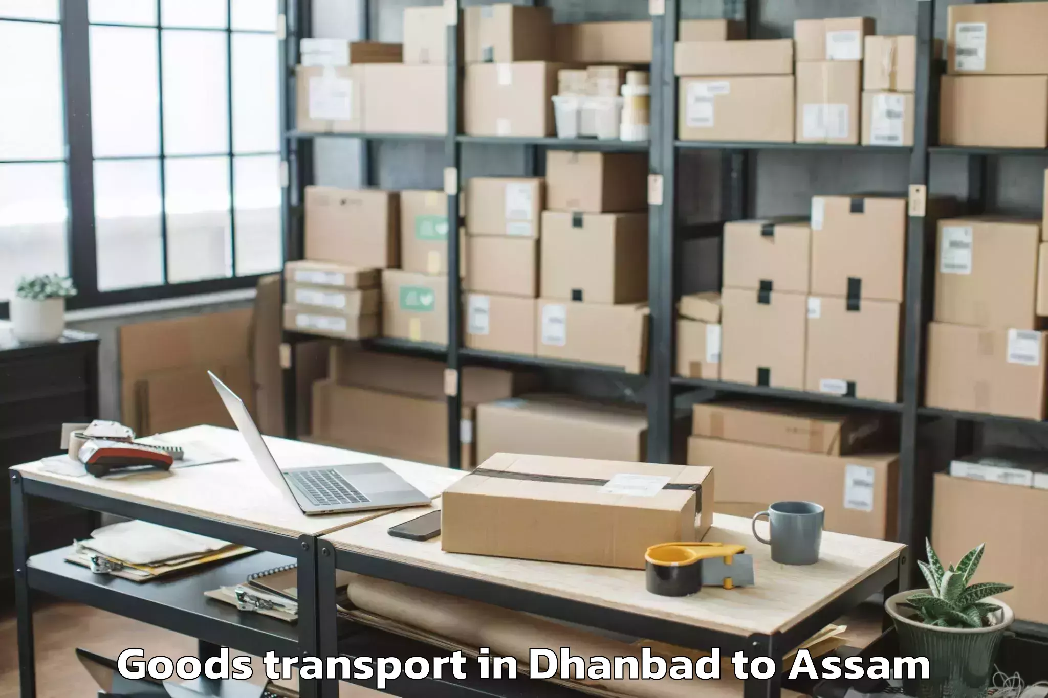 Book Dhanbad to Bongaigaon Pt Goods Transport Online